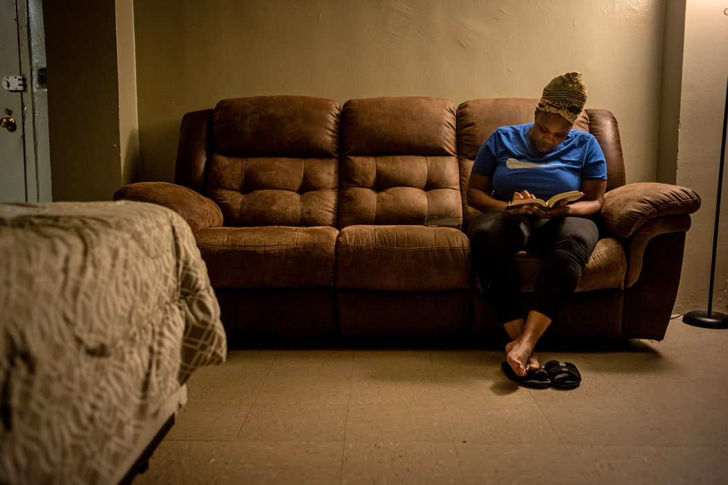 Naquasia Pollard reading her Koran after her morning prayer. Halfway through a 15-year prison sentence, she decided to take classes to earn a college degree in sociology.